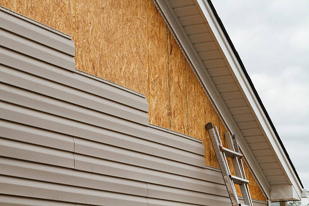 Professional Siding Replacement technician working in Kittrell, NC